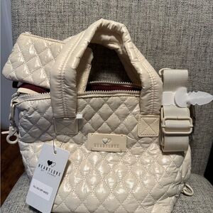 Off-white/cream quilted handbag